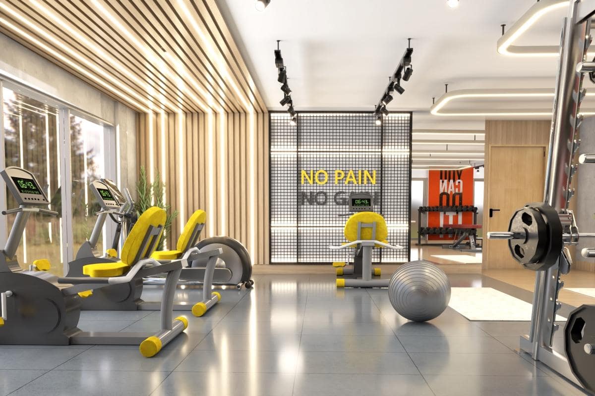 3d model of gym interior with workout machines placed on the floor
